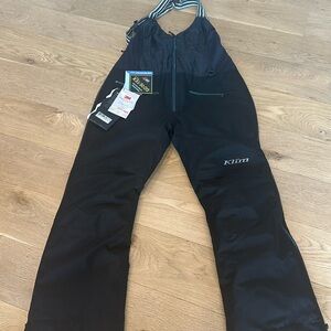 Klim Women’s large black ski bib pants.